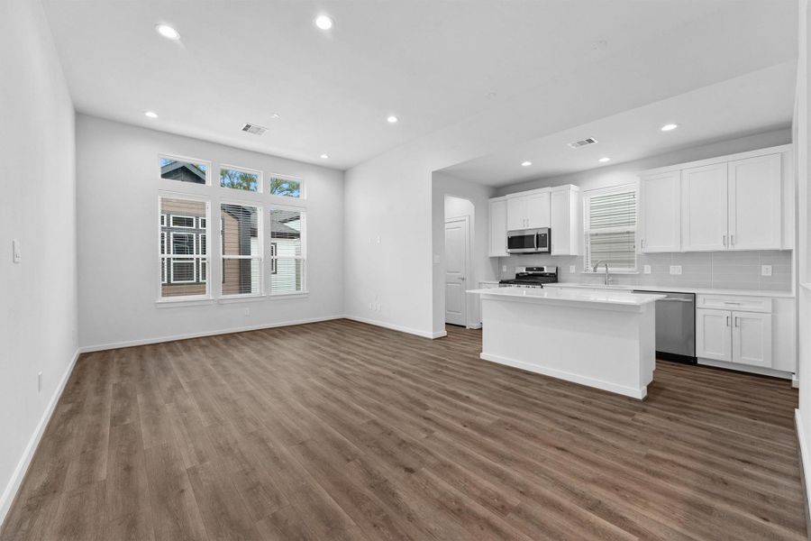 Living area and kitchen view from 2nd floor Living area and kitchen view from 2nd floor