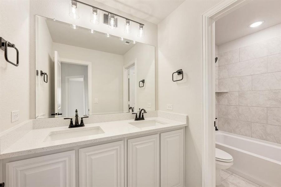 Furnished interior view inside a new home in Waterscape, Royse City (Image 14).