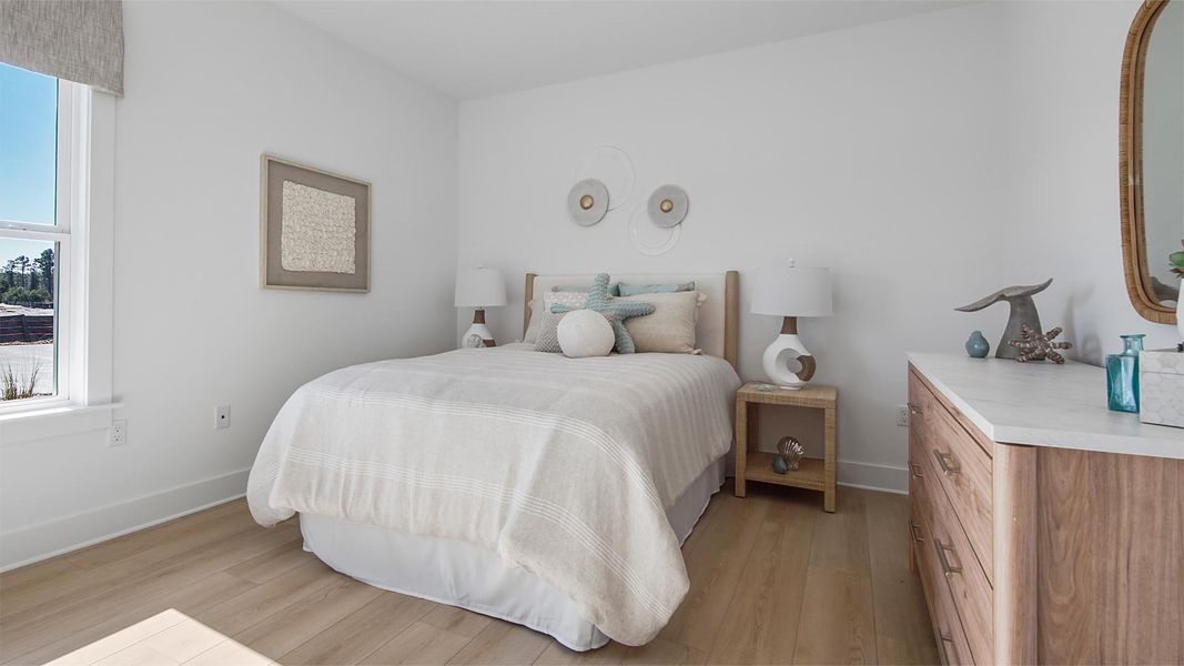 Representative furnished interior of a home built from the Jubilee by D.R. Horton in Breakfast Point East Phase II, Panama City Beach (Image 33).