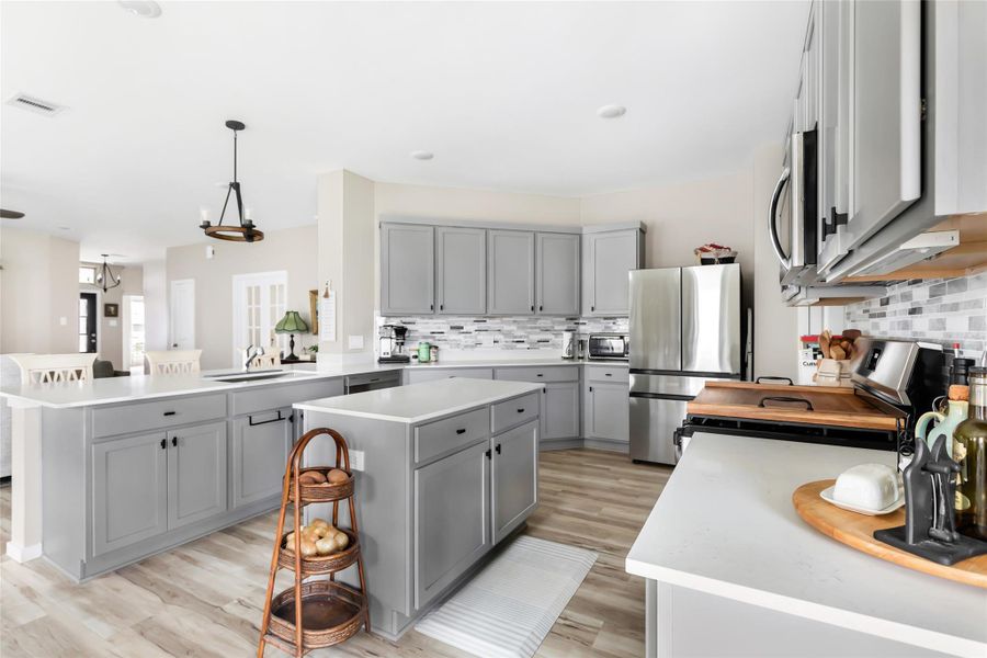 Furnished interior view inside a new home in Pinewood at Grand Texas, New Caney (Image 12).