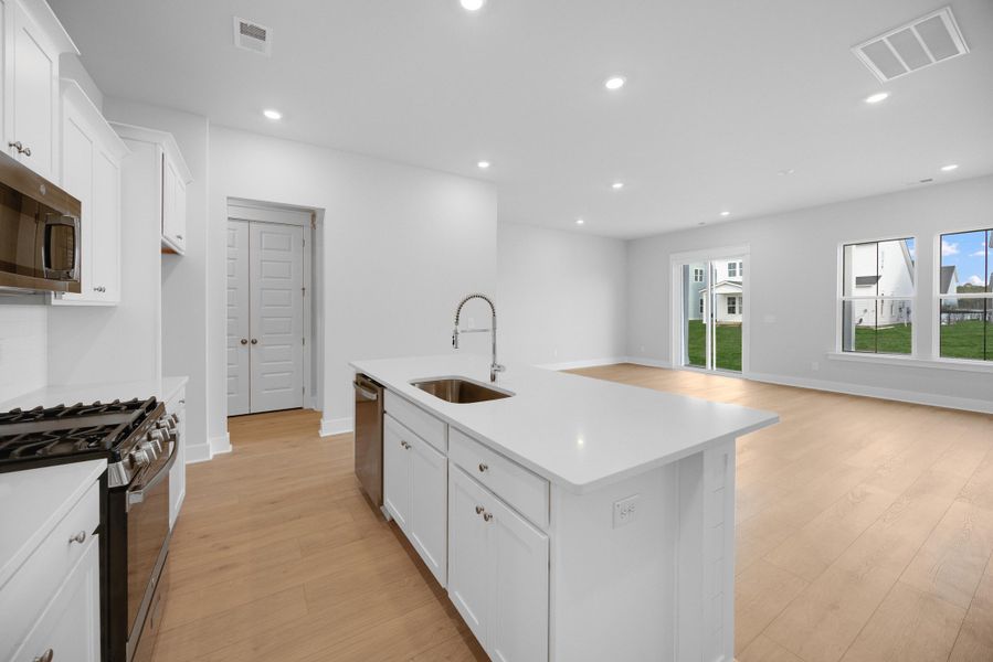 Furnished interior view inside a new home in Carnes Crossroads: Villas Collection, Summerville (Image 3).