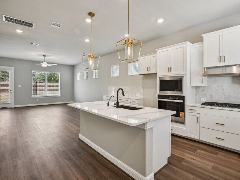 Furnished interior view inside a new home in Pinewood Trails - Luxe Series, Atascocita (Image 5). Furnished interior view inside a new home in Pinewood Trails - Luxe Series, Atascocita (Image 5).