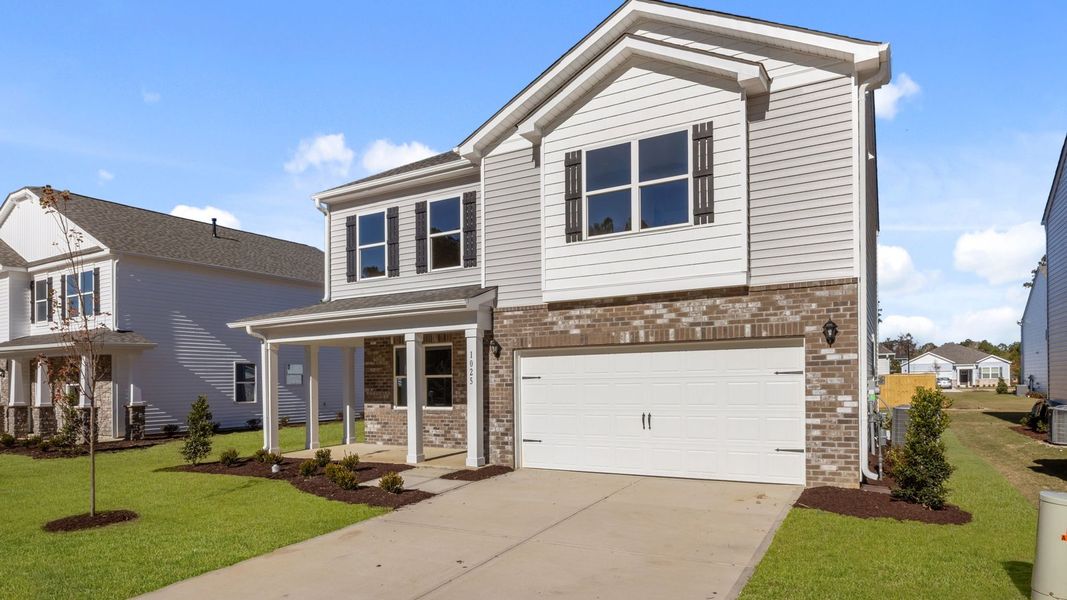 Front exterior of a new home in West New Bern, New Bern, NC, highlighting curb appeal (Image 20).