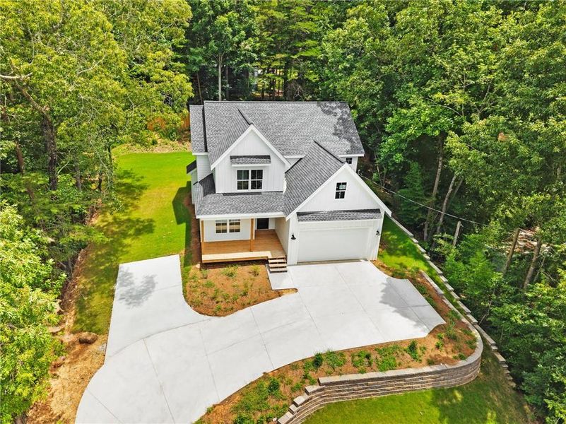 Front exterior of a new home in , Gainesville, GA, highlighting curb appeal (Image 26).