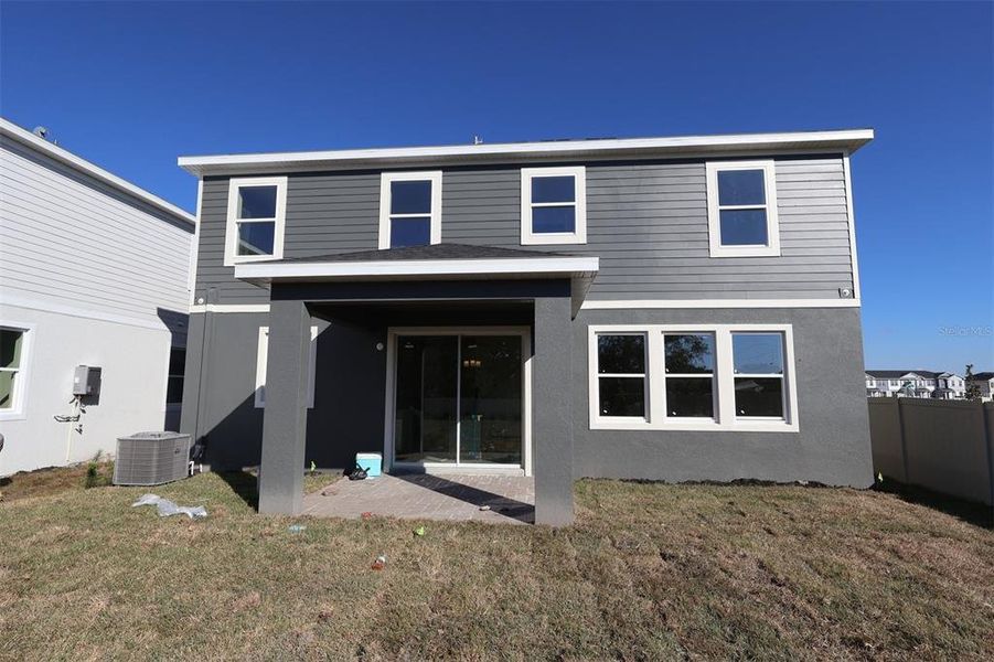 Exterior details and patio area of a home in Center Lake on the Park, St. Cloud (Image 3). Exterior details and patio area of a home in Center Lake on the Park, St. Cloud (Image 3).