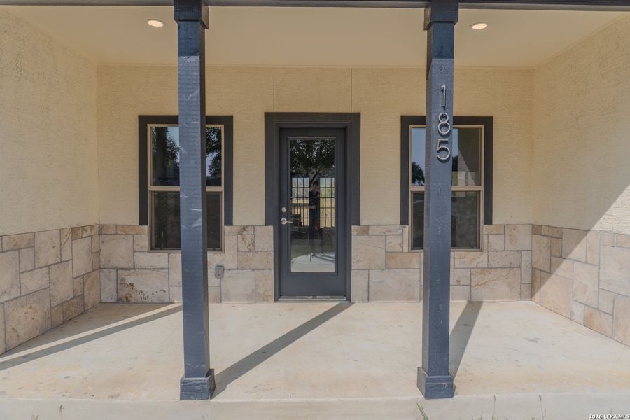 Exterior details and patio area of a home in , Lytle (Image 3).
