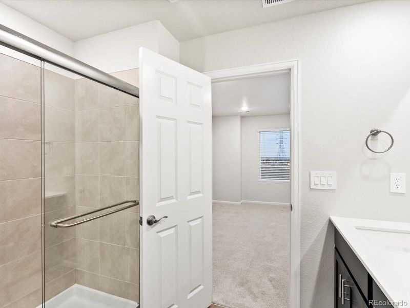 Furnished interior view inside a new home in Three Hills, Morrison (Image 8).