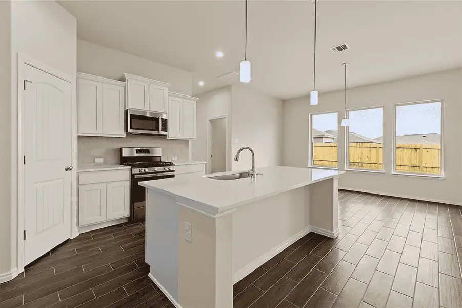 Representative furnished interior of a home built from the Sarah 2070 S by Saratoga Homes in Foxtail Palms, Manvel (Image 3).