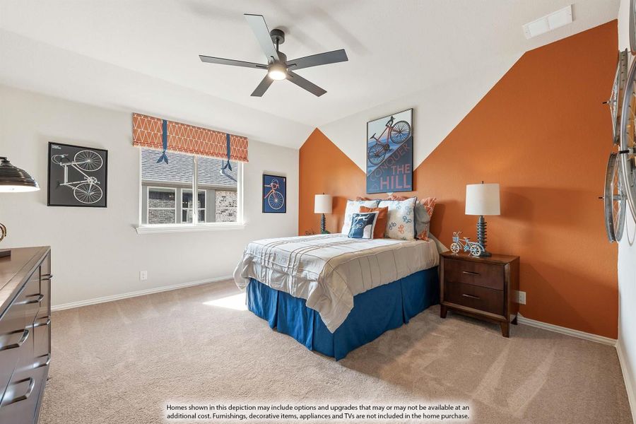 Bedroom with orange accent wall, ceiling fan, carpet, and bicycle-themed decor Bedroom with orange accent wall, ceiling fan, carpet, and bicycle-themed decor