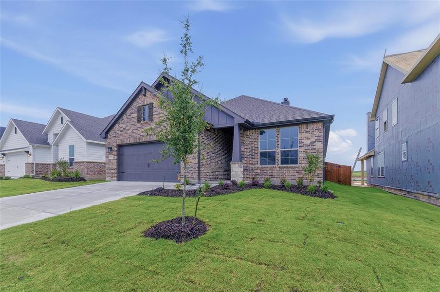 Front exterior of a new home in Covenant Park, Springtown, TX, highlighting curb appeal (Image 16). Front exterior of a new home in Covenant Park, Springtown, TX, highlighting curb appeal (Image 16).