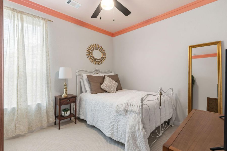 Secondary bedroom with a nice window for natural light
