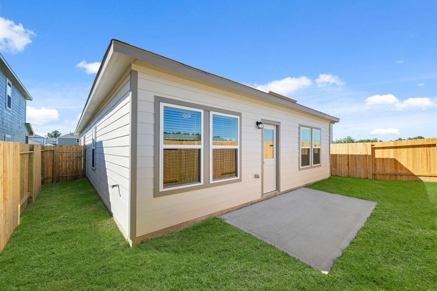 Exterior details and patio area of a home in Northpark South, Porter (Image 3). Exterior details and patio area of a home in Northpark South, Porter (Image 3).