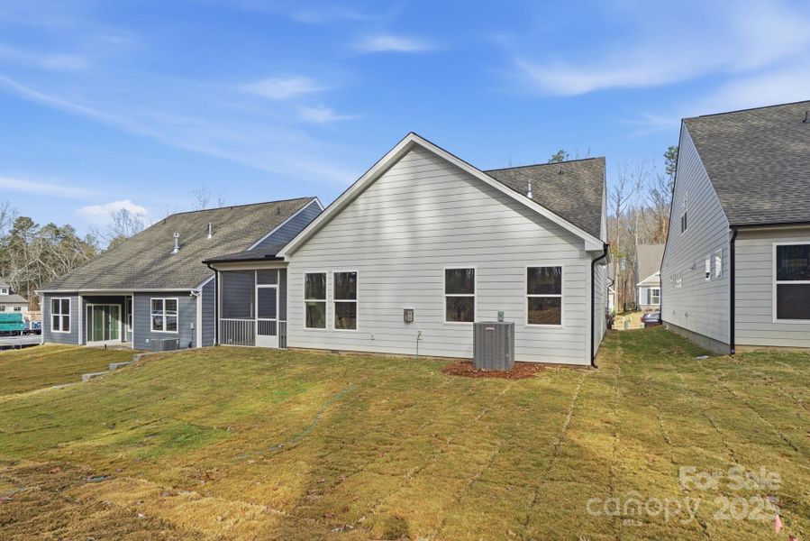 Exterior details and patio area of a home in Villas at Prestwick, Mooresville (Image 27).