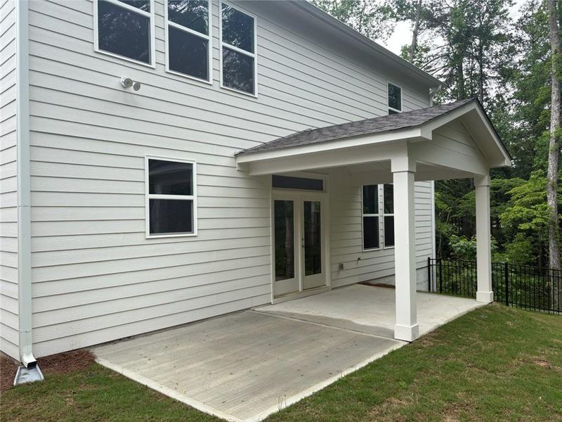 Front exterior of a new home in Riverwood, Dallas, GA, highlighting curb appeal (Image 21).