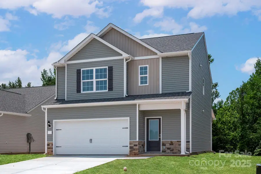 Front exterior of a new home in , Winston-Salem, NC, highlighting curb appeal (Image 1).