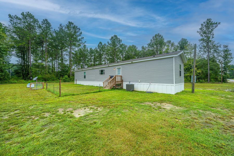 Front exterior of a new home in , Eutawville, SC, highlighting curb appeal (Image 19). Front exterior of a new home in , Eutawville, SC, highlighting curb appeal (Image 19).