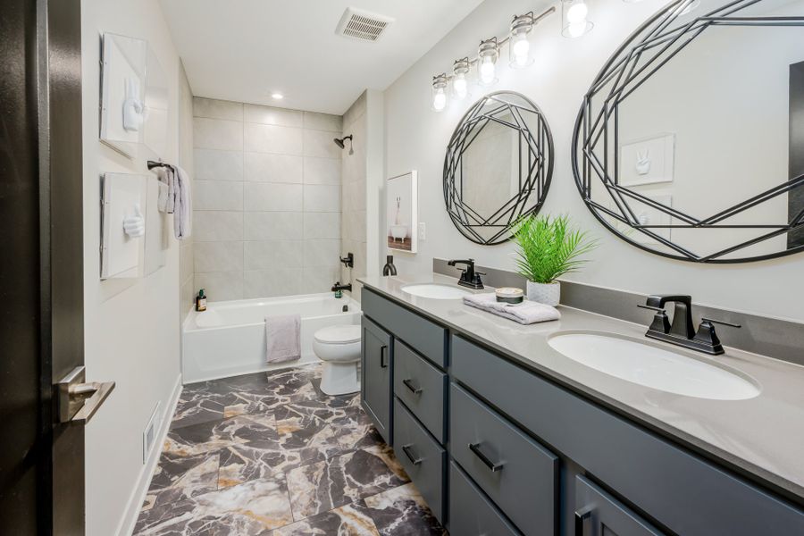 Representative furnished interior of a home built from the Leland by Fischer Homes in Hidden Fields, Hoschton (Image 34).