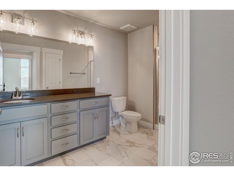 Furnished interior view inside a new home in Highlands at Fox Hill - The Flats, Longmont (Image 8). Furnished interior view inside a new home in Highlands at Fox Hill - The Flats, Longmont (Image 8).