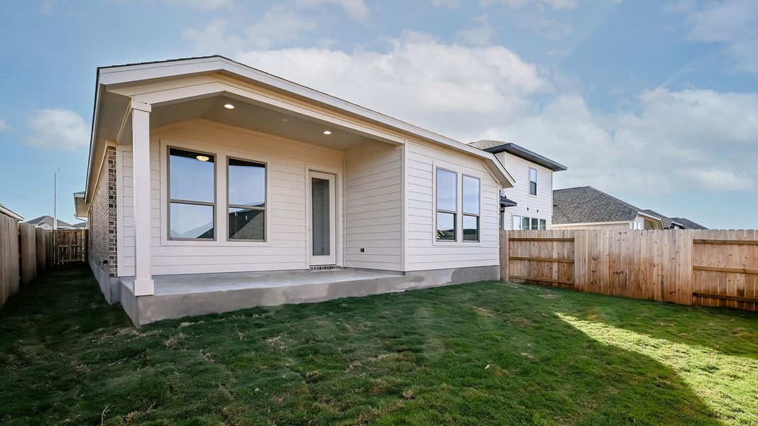 Exterior details and patio area of a home in Crosswinds, Kyle (Image 3).