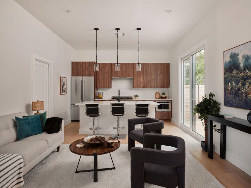 Living room featuring light wood-style floors Living room featuring light wood-style floors