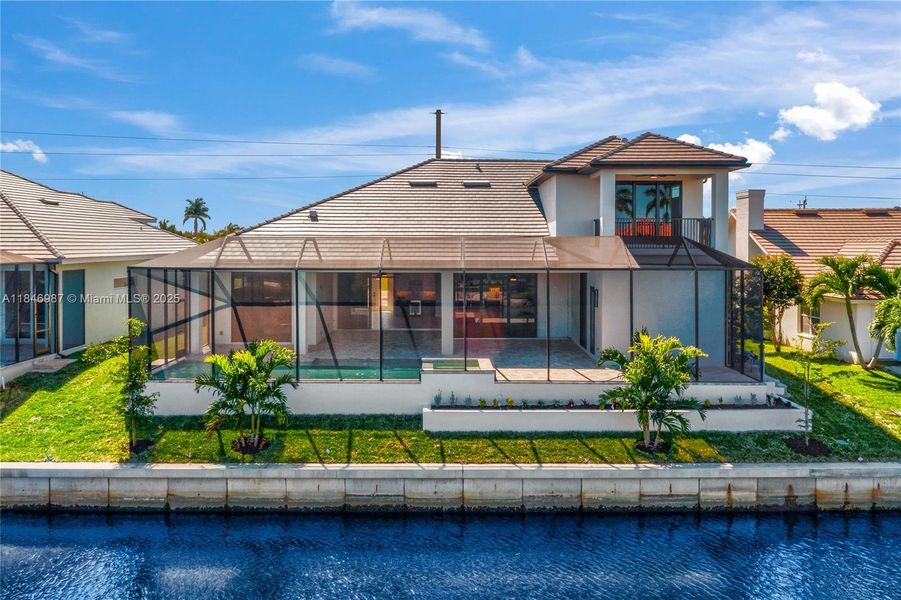 Front exterior of a new home in , Cape Coral, FL, highlighting curb appeal (Image 2). Front exterior of a new home in , Cape Coral, FL, highlighting curb appeal (Image 2).