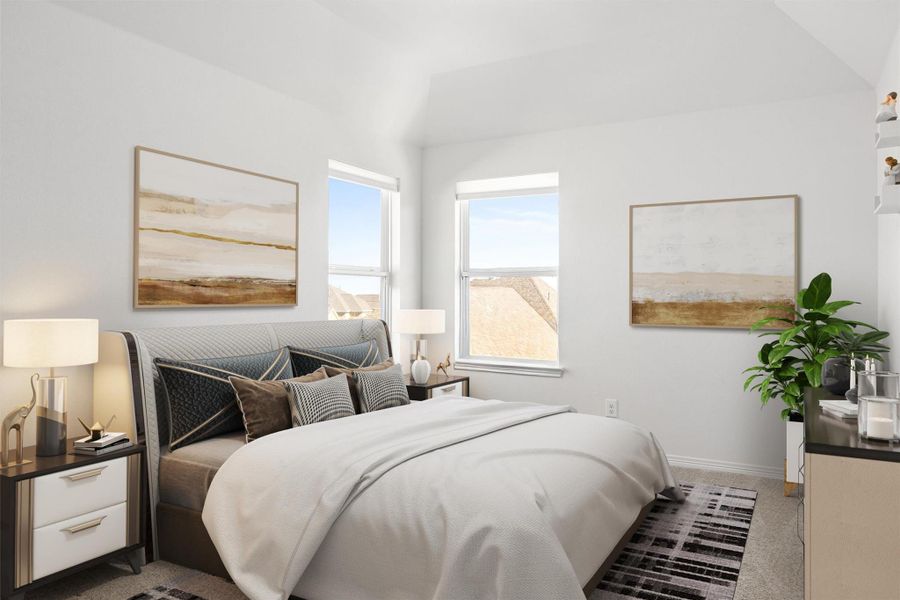 Bedroom with light colored carpet and lofted ceiling Bedroom with light colored carpet and lofted ceiling