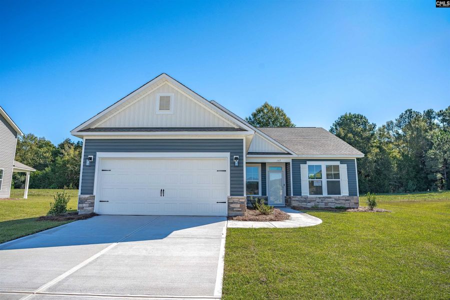 Front exterior of a new home in Rolling Hills, Prosperity, SC, highlighting curb appeal (Image 18).