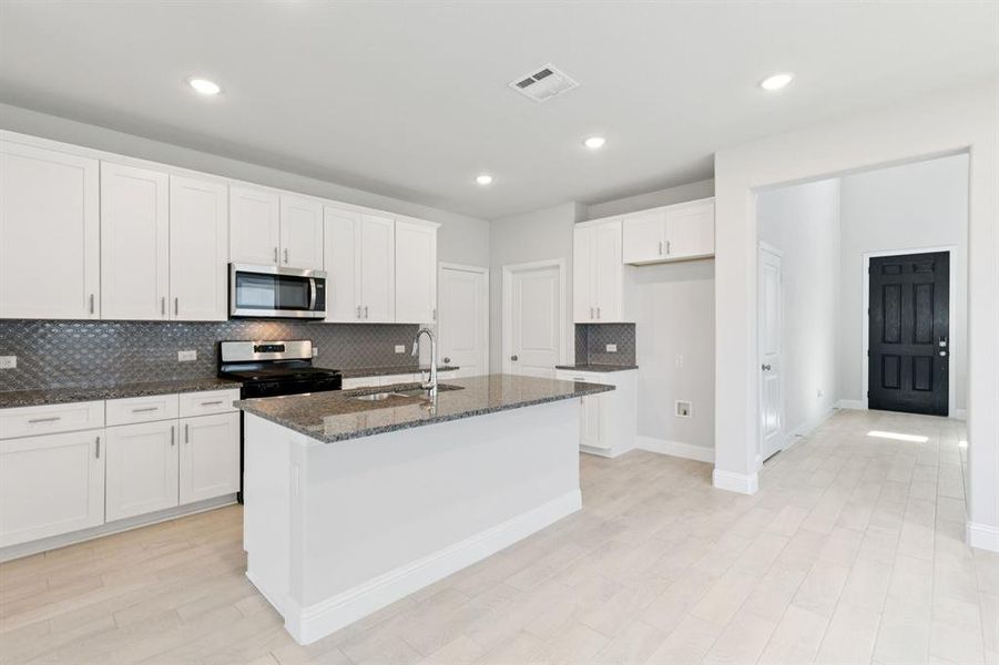 Furnished interior view inside a new home in Venetian, Weston (Image 12).