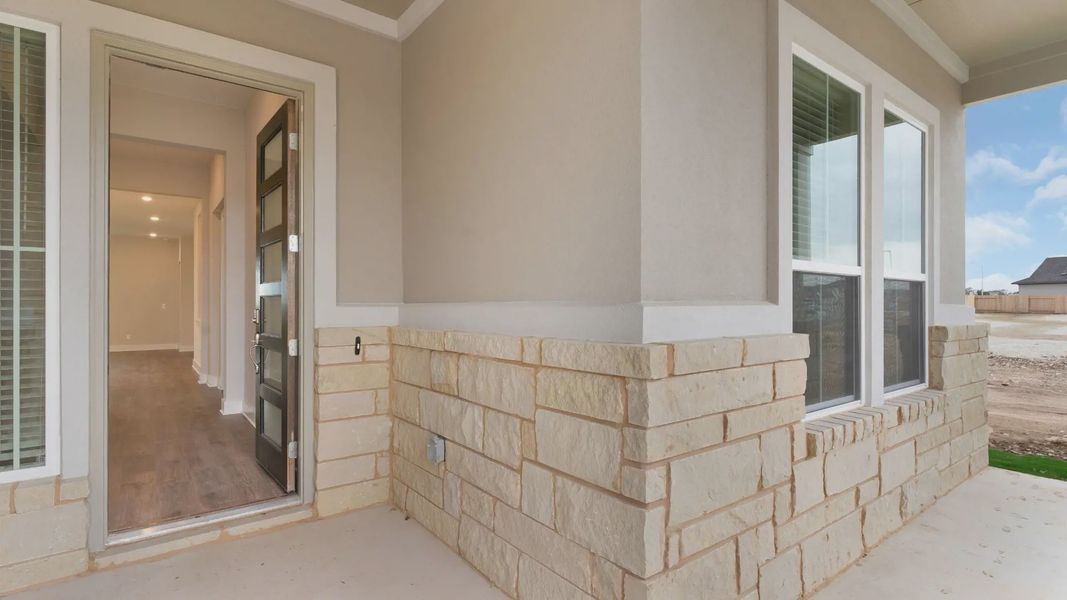 Representative exterior details of a home built from the Lucas by Chesmar Homes in Santa Rita Ranch, Liberty Hill (Image 2). Representative exterior details of a home built from the Lucas by Chesmar Homes in Santa Rita Ranch, Liberty Hill (Image 2).