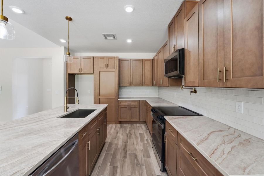 Furnished interior view inside a new home in , Conroe (Image 6).