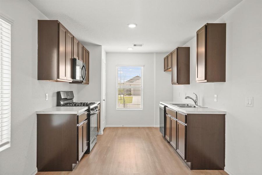 This kitchen is perfect for everyday life as well as entertaining family and friends!