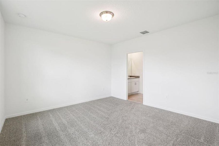 Spacious, unfurnished interior of a new home in Villamar - Classic Series, Winter Haven (Image 25).