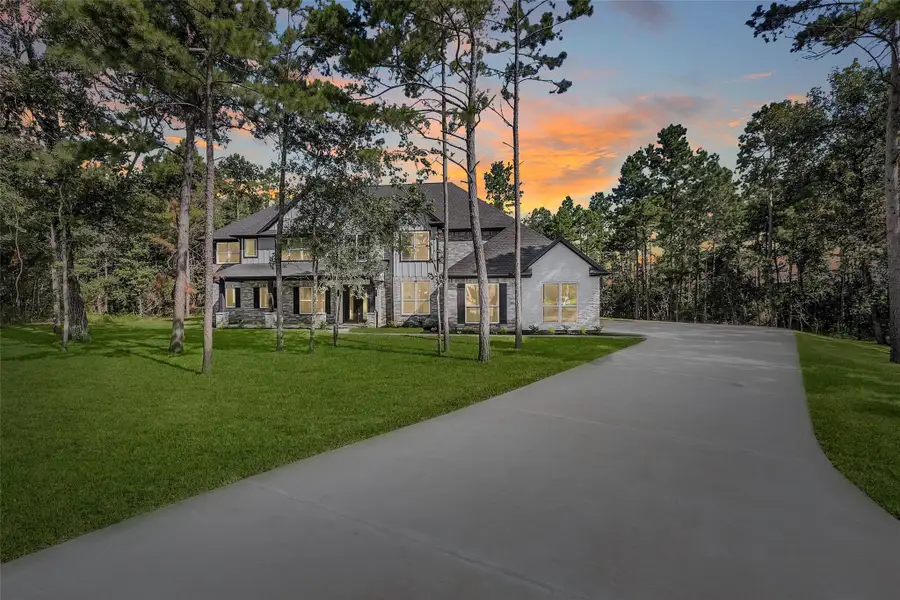 Front exterior of a new home in , Montgomery, TX, highlighting curb appeal (Image 6).