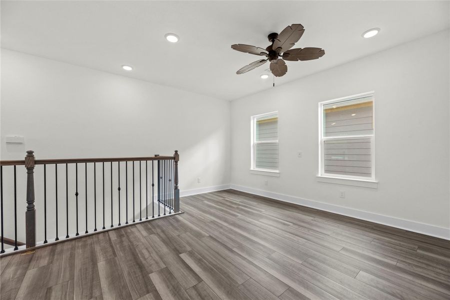 Enjoy this spacious upstairs retreat offering an open layout perfect for family gatherings or a media setup. Natural light fills the room, creating an inviting atmosphere ideal for relaxing or entertaining. Enjoy this spacious upstairs retreat offering an open layout perfect for family gatherings or a media setup. Natural light fills the room, creating an inviting atmosphere ideal for relaxing or entertaining.