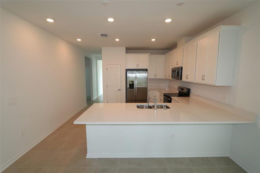 Furnished interior view inside a new home in , Sarasota (Image 5).
