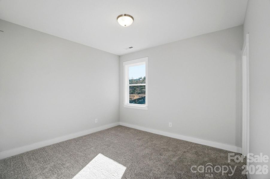 Spacious, unfurnished interior of a new home in Rone Creek, Waxhaw (Image 29).