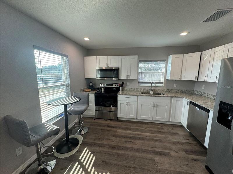 Furnished interior view inside a new home in , Dunnellon (Image 4).