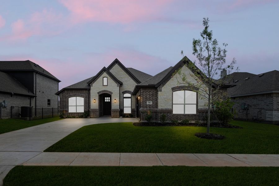 Front exterior of a new home in Abe's Landing, Granbury, TX, highlighting curb appeal (Image 1). Front exterior of a new home in Abe's Landing, Granbury, TX, highlighting curb appeal (Image 1).