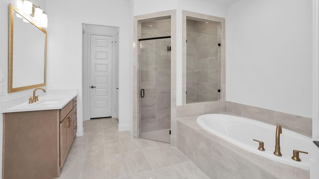 Furnished interior view inside a new home in The Highlands 65', Porter (Image 8).