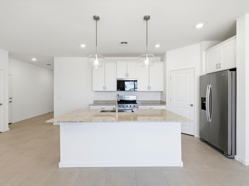 Furnished interior view inside a new home in Silva Farms - Classic Series, Goodyear (Image 2).