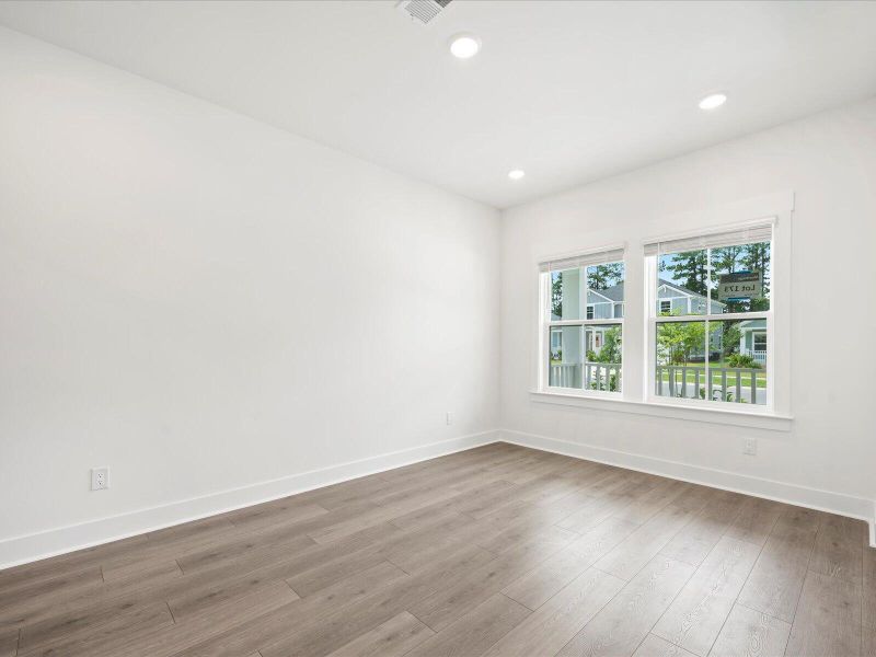 Spacious, unfurnished interior of a new home in The Coves at Lakes of Cane Bay, Summerville (Image 36). Spacious, unfurnished interior of a new home in The Coves at Lakes of Cane Bay, Summerville (Image 36).