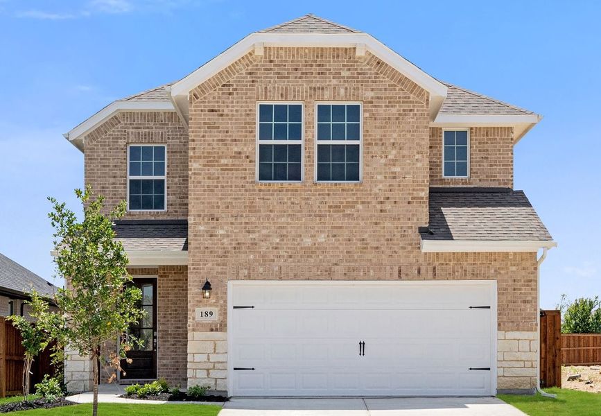 Representative exterior photo of a completed home built from the Walton by UnionMain Homes in Creekside, Royse City, TX (Image 10). Representative exterior photo of a completed home built from the Walton by UnionMain Homes in Creekside, Royse City, TX (Image 10).