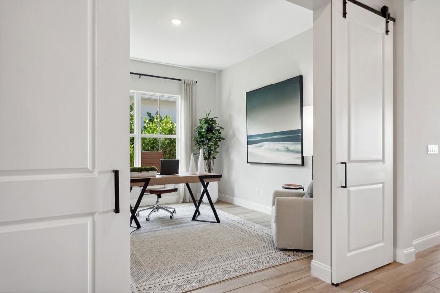 Home office with barn doors