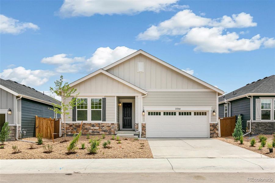 Front exterior of a new home in Terrain Oak Valley, Castle Rock, CO, highlighting curb appeal (Image 23).