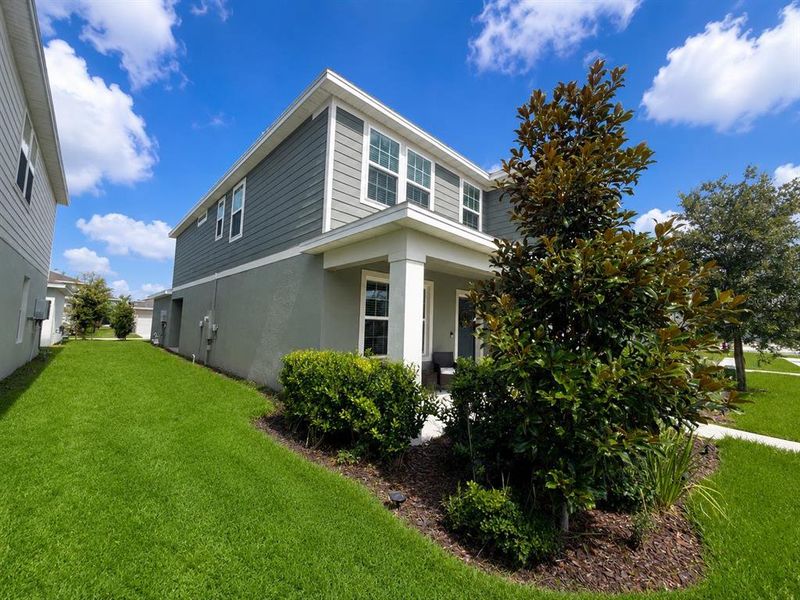 Exterior details and patio area of a home in Winding Meadows, Apopka (Image 26).