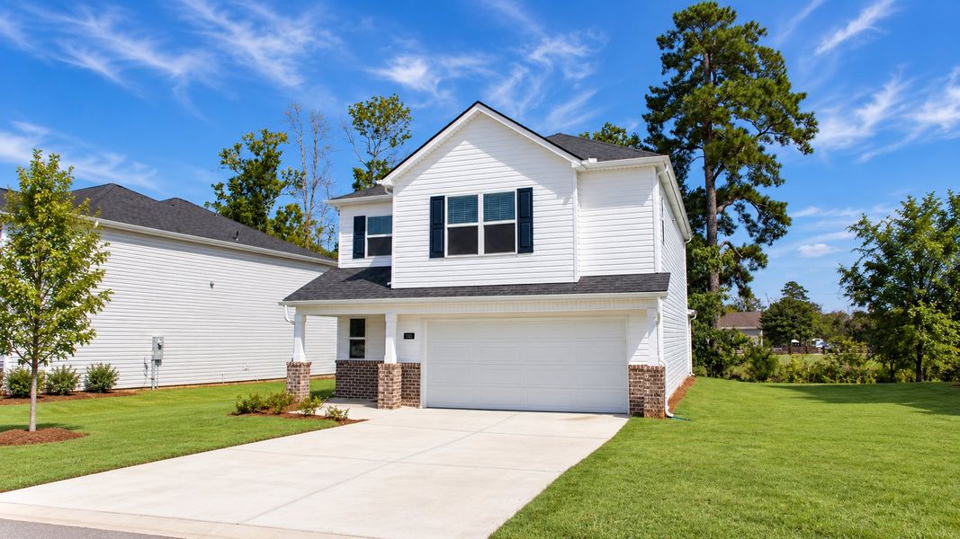 Front exterior of a new home in Evergreen Landing, Rossville, GA, highlighting curb appeal (Image 21). Front exterior of a new home in Evergreen Landing, Rossville, GA, highlighting curb appeal (Image 21).