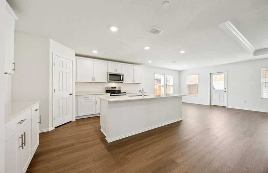 Airy kitchen with ample cabinet space Airy kitchen with ample cabinet space