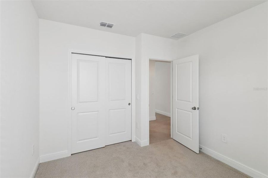 Spacious, unfurnished interior of a new home in The Reserve at Hammock Oaks - Classic Series, Lady Lake (Image 21). Spacious, unfurnished interior of a new home in The Reserve at Hammock Oaks - Classic Series, Lady Lake (Image 21).