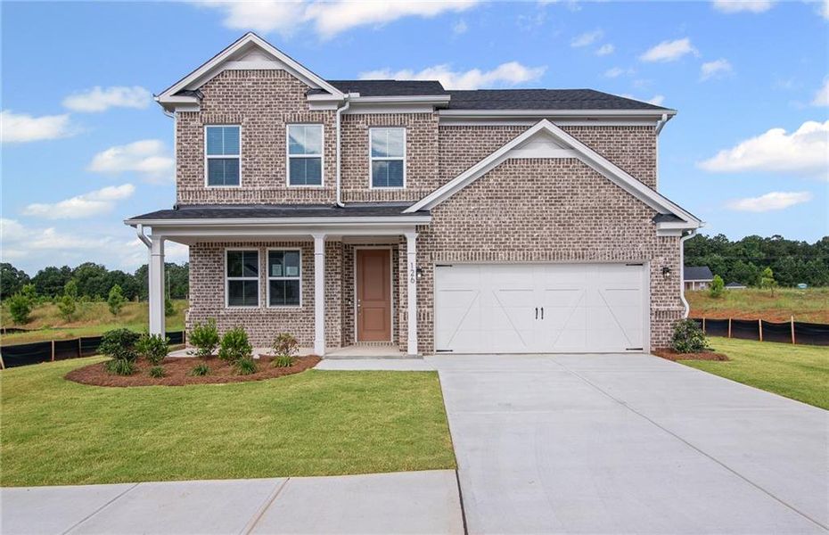 Front exterior of a new home in Overland, Locust Grove, GA, highlighting curb appeal (Image 1). Front exterior of a new home in Overland, Locust Grove, GA, highlighting curb appeal (Image 1).