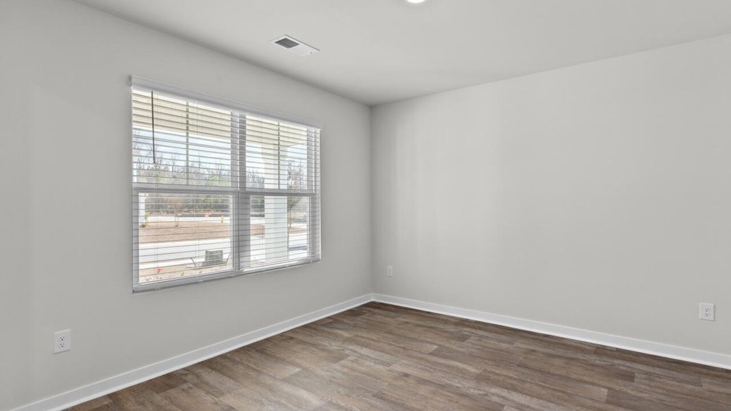 Spacious, unfurnished interior of a new home in Sidbury Station, Castle Hayne (Image 16).